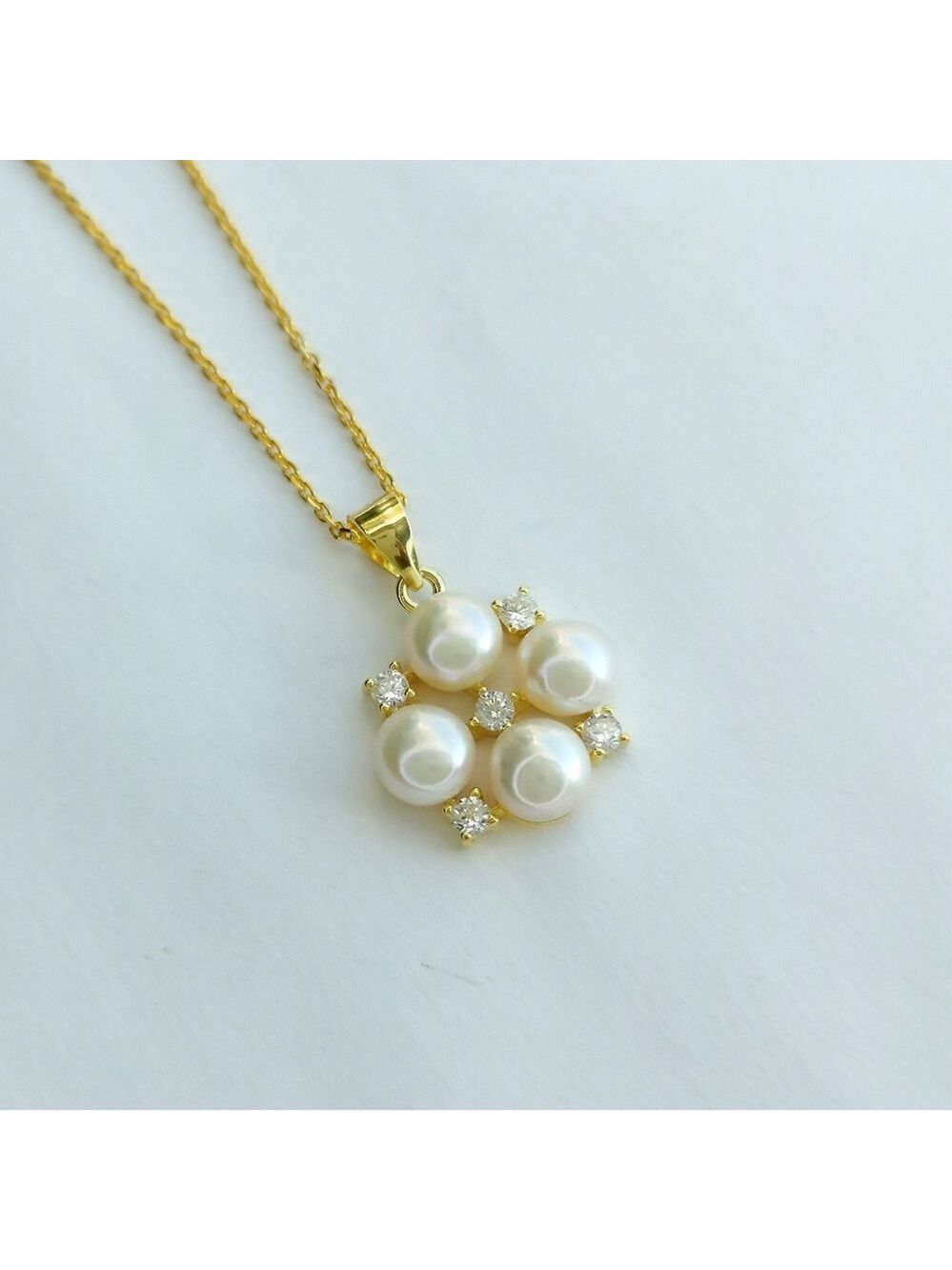 White cultured pearl pendant necklace with white Sapphire in 14k gold